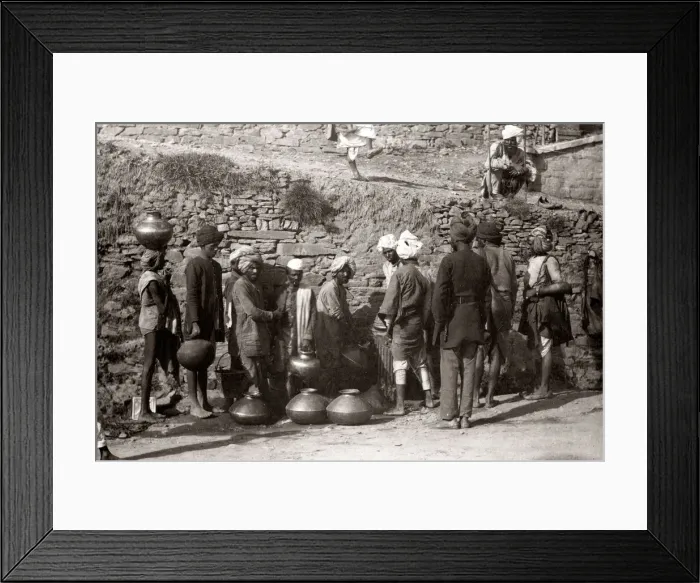 Framed Print : Porter filling water containers, India, c. 1880 s Framed Print : Porter filling water containers, India, c. 1880 s