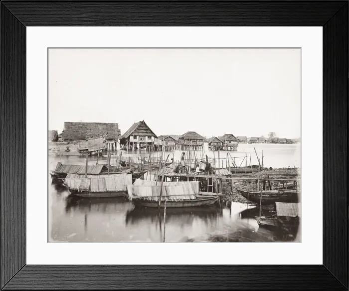 Framed Print : SE Asia, probably Malay peninsula, villages houses on stilts, rive boats Framed Print : SE Asia, probably Malay peninsula, villages houses on stilts, rive boats