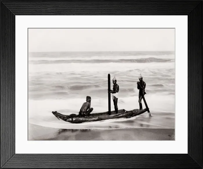 Framed Print : Boatmen on the sea on a traditional wood canoe Framed Print : Boatmen on the sea on a traditional wood canoe