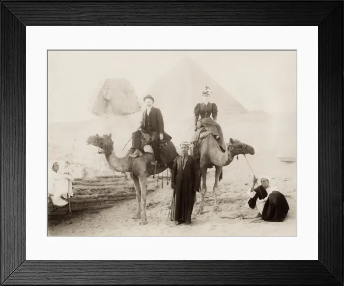Framed Print : Tourists on camels with guides visiting the Sphinx Framed Print : Tourists on camels with guides visiting the Sphinx