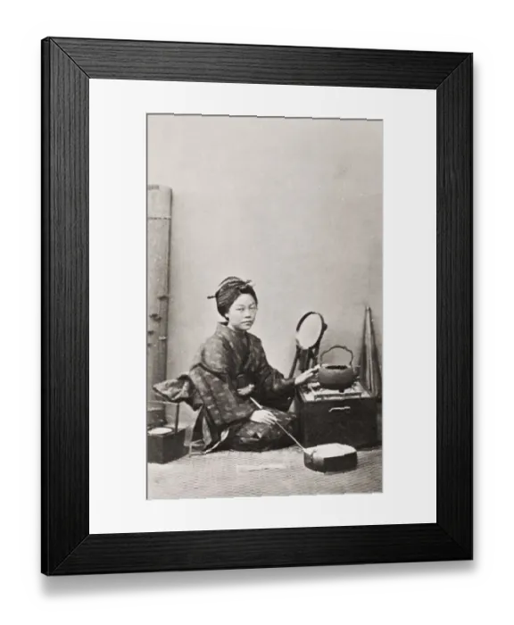 Framed Print : Woman at a stove, Japan Framed Print : Woman at a stove, Japan