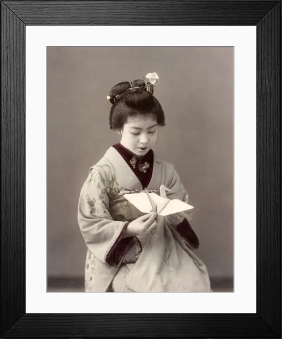 Framed Print : c. 1880s Japan - geisha with a paper bird Framed Print : c. 1880s Japan - geisha with a paper bird