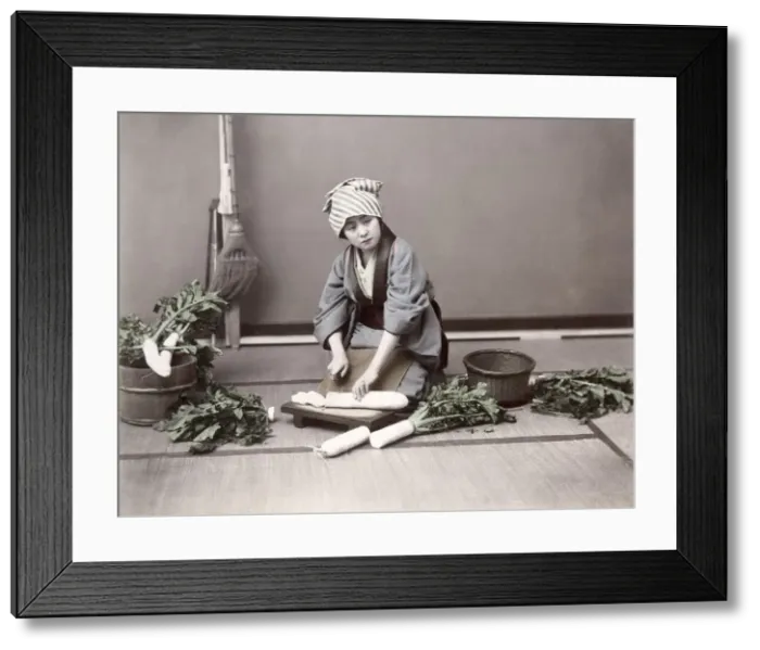 Framed Print : c. 1880s Japan - young woman preparing vegetables Framed Print : c. 1880s Japan - young woman preparing vegetables