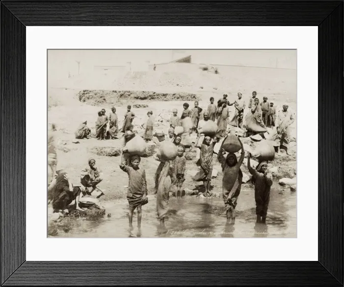 Framed Print : Women filling water pots from the River Nile, Egypt Framed Print : Women filling water pots from the River Nile, Egypt