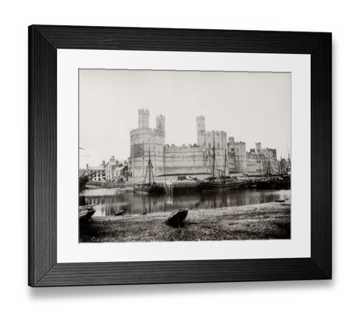 Framed Print : Carnarvon Castle, Wales, boats in the foreground Framed Print : Carnarvon Castle, Wales, boats in the foreground