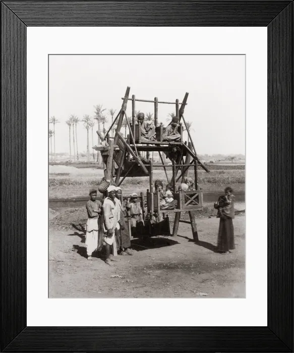 Framed Print : Children on an early funfair ride, Egypt, c. 1890 Framed Print : Children on an early funfair ride, Egypt, c. 1890