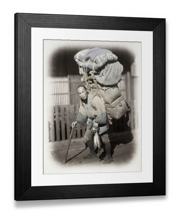 Framed Print : 1860s Japan - portrait of a coolie or porter with a heavy load Felice or Felix Beato