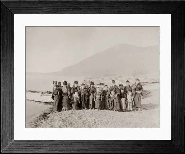 Framed Print : Vintage 19th century photograph: group of children on a shore in front of a fishing boat Framed Print : Vintage 19th century photograph: group of children on a shore in front of a fishing boat