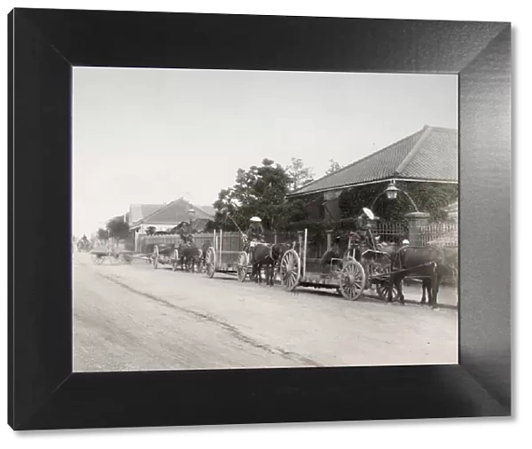 Vintage late 19th century photograph: Horse carts, cargo wagons, Bund, Yokohama, Japan