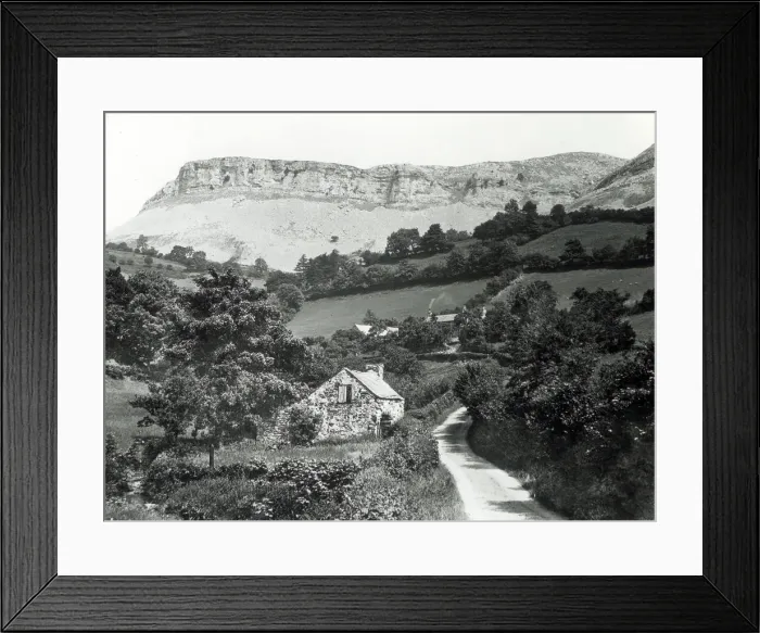 Framed Print : Quiet Welsh country lane with steep rocky escarpment Framed Print : Quiet Welsh country lane with steep rocky escarpment