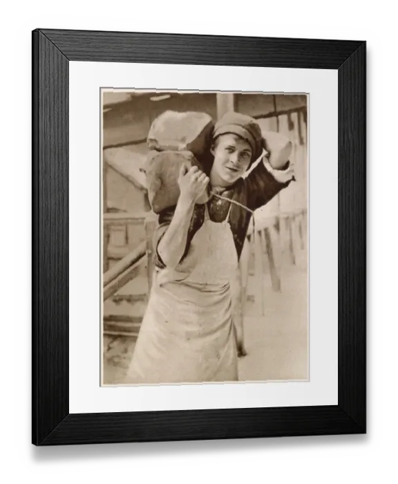 Framed Print : A young lad carrying the clay. Date: 1913 Framed Print : A young lad carrying the clay. Date: 1913