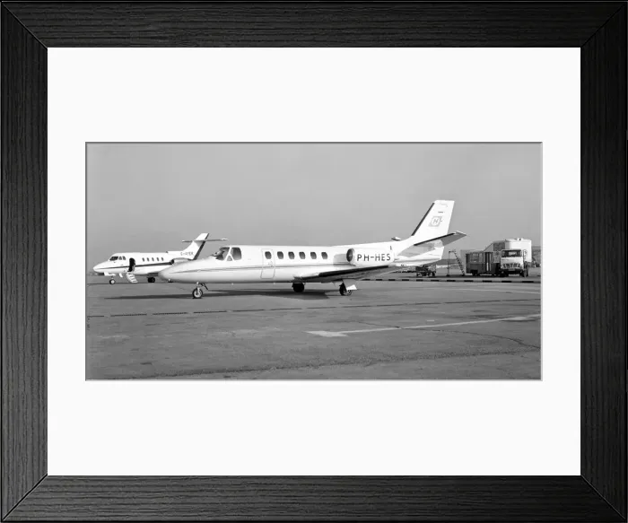 Framed Print : Cessna 550 Citation II PH-HES with HS-125-400A G-AYER Framed Print : Cessna 550 Citation II PH-HES with HS-125-400A G-AYER