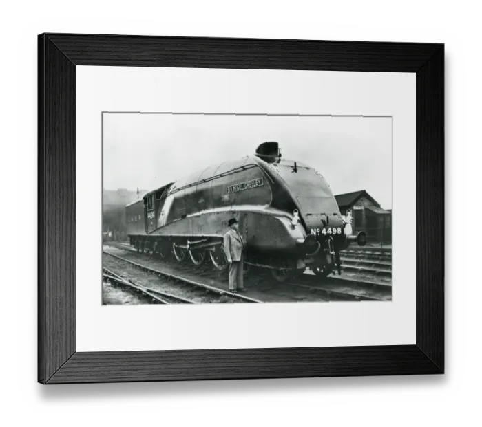 Framed Print : Nigel Gresley standing alongside his A4 class steam engine Framed Print : Nigel Gresley standing alongside his A4 class steam engine