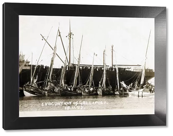 The Evacuation of Greeks from Gallipoli, Turkey - November 18, 1922. Small boats loaded with refugees against a larger Greek steamer, one of the last boats to leave Gallipoli. Date: 1922