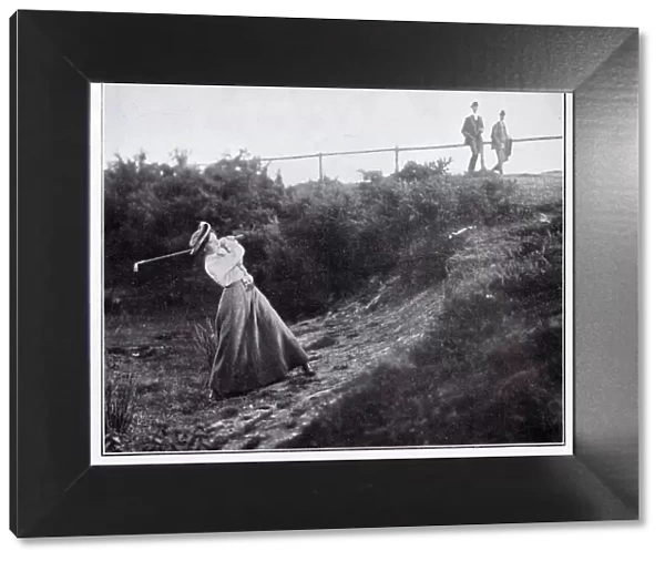 Miss Macbeth playing a shot out of a bunker at the Ashdown Forest Club Ladies Meeting. Date: 1909