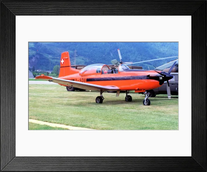 Framed Print : Swiss Air Force - Pilatus PC-7 Turbo Trainer A-938 (msn 346). (German: Schweizer Luftwaffe; French: Forces aeriennes suisses; Italian: Forze aeree svizzere; Romansh: Aviatica militara svizra) Date: circa 1995 Framed Print : Swiss Air Force - Pilatus PC-7 Turbo Trainer A-938 (msn 346). (German: Schweizer Luftwaffe; French: Forces aeriennes suisses; Italian: Forze aeree svizzere; Romansh: Aviatica militara svizra) Date: circa 1995