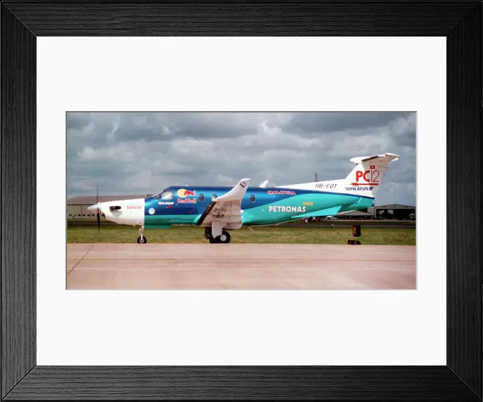 Framed Print : Pilatus PC-12 HB-FOT (msn 121), of Pilatus Flugzeugwerke AG. at the Royal International Air Tattoo - RAF Fairford 21 July 2003. Date: 2003 Framed Print : Pilatus PC-12 HB-FOT (msn 121), of Pilatus Flugzeugwerke AG. at the Royal International Air Tattoo - RAF Fairford 21 July 2003. Date: 2003