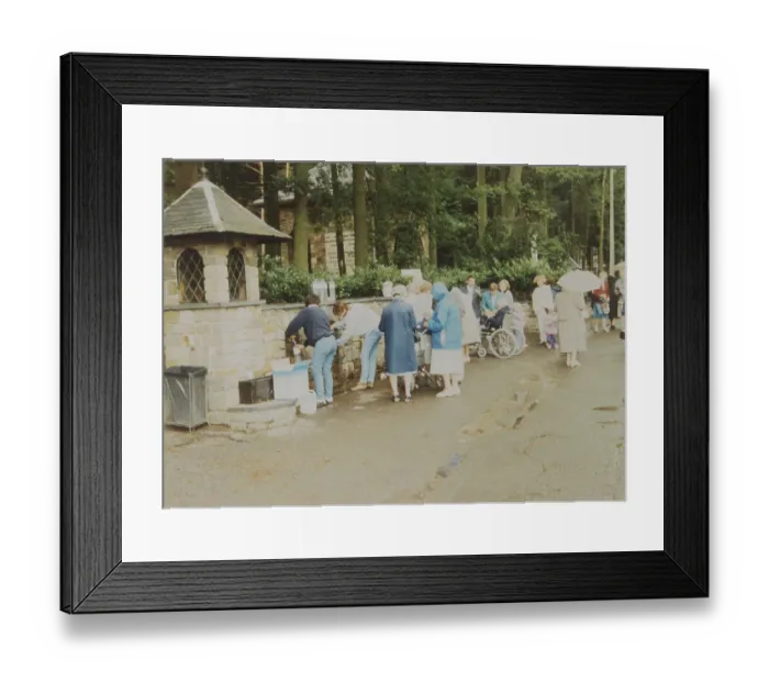 Framed Print : At Banneux, Belgium, where the Virgin Mary appeared to Mariette Beco in 1933, pilgrims stock up with water from the sacred spring which she caused to flow Date: 1990 Framed Print : At Banneux, Belgium, where the Virgin Mary appeared to Mariette Beco in 1933, pilgrims stock up with water from the sacred spring which she caused to flow Date: 1990
