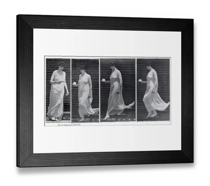Framed Print : Woman in a long dress carrying a cup and saucer Date: 1887 Framed Print : Woman in a long dress carrying a cup and saucer Date: 1887