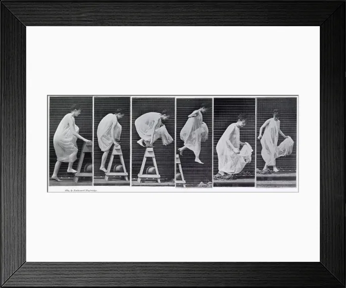 Framed Print : Woman in a long dress surmounting an obstacle. Date: 1880s Framed Print : Woman in a long dress surmounting an obstacle. Date: 1880s