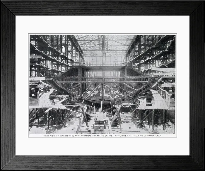 Framed Print : An inside view of a covered slip, with overhead travelling cranes at the Germania yard at Kiel, Germany. The ship being built is Battleship L'. Date: 1902 Framed Print : An inside view of a covered slip, with overhead travelling cranes at the Germania yard at Kiel, Germany. The ship being built is Battleship L'. Date: 1902