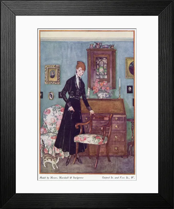Framed Print : Black gown by Marshall & Snelgrove: raglan sleeves, turn back cuffs, long gored skirt with tiny patch pockets ornamented with tassels, white blouse & Louis heel shoes. Date: 1915