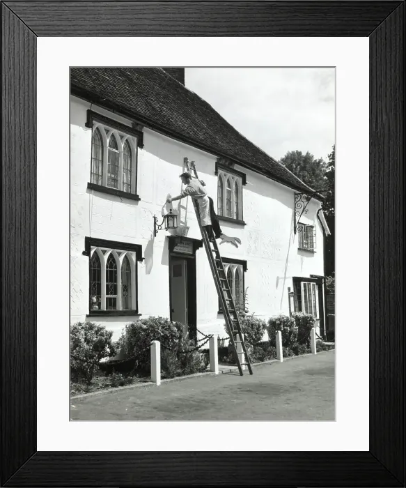 Framed Print : The village decorator, busy painting the front of The Fox Inn, at Finchingfield, Essex, England. Date: 1960s Framed Print : The village decorator, busy painting the front of The Fox Inn, at Finchingfield, Essex, England. Date: 1960s