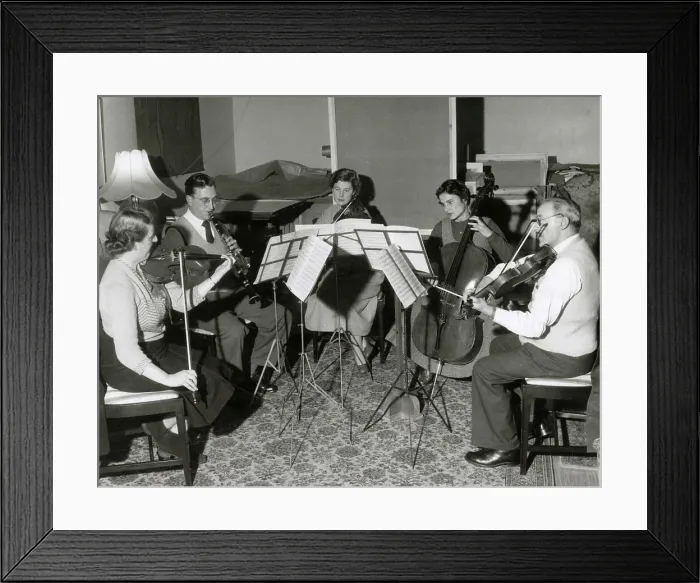 Framed Print : A musical quintet rehearse a piece of classical music. Date: 1930s Framed Print : A musical quintet rehearse a piece of classical music. Date: 1930s
