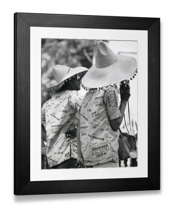Framed Print : Two revellers in matching party shirts and straw hats at the Port of Spain Carnival, Trinidad, West Indies. Date: 1968 Framed Print : Two revellers in matching party shirts and straw hats at the Port of Spain Carnival, Trinidad, West Indies. Date: 1968