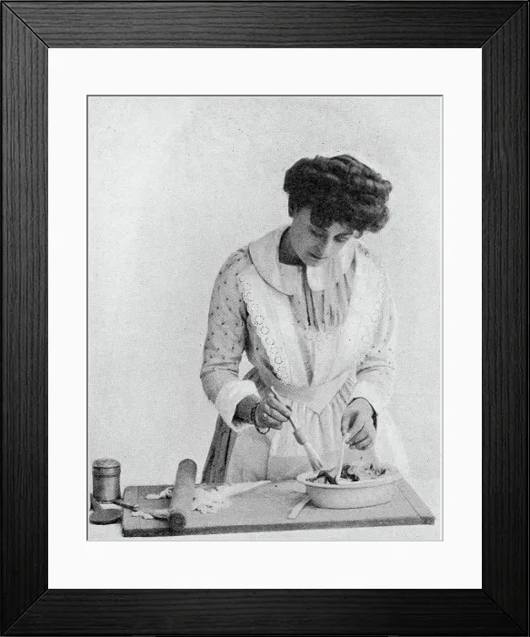 Framed Print : Damp the pie-dish with white of egg to make the paste stick. Date: 1907 Framed Print : Damp the pie-dish with white of egg to make the paste stick. Date: 1907