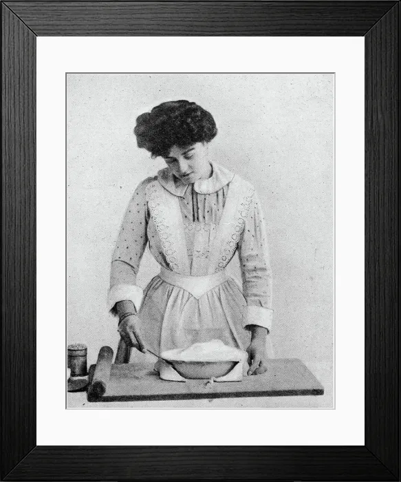 Framed Print : Trim the edge of the tart with share knife. Date: 1907