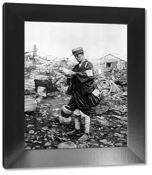 Tokyo postman delivering letters to the rubble
