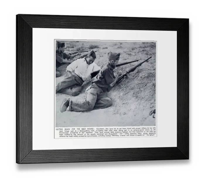Framed Print : Two Nationalist volunteers reloading their rifles as they fire at a Republican position near San Sebastian, northern Spain, during the early stages of the Spanish Civil War, 1936 Framed Print : Two Nationalist volunteers reloading their rifles as they fire at a Republican position near San Sebastian, northern Spain, during the early stages of the Spanish Civil War, 1936