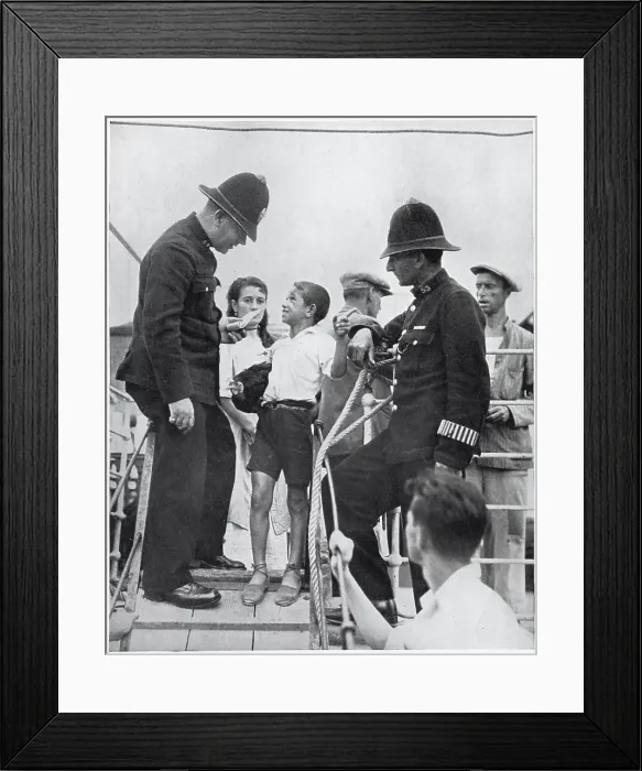 Framed Print : Two members of Gibraltar's police force questioning a Spanish boy on the gang-way of a refugee boat, August 1936. The Spanish Civil War, which started in the summer of 1936, meant that thousands of Spaniards became refugees Framed Print : Two members of Gibraltar's police force questioning a Spanish boy on the gang-way of a refugee boat, August 1936. The Spanish Civil War, which started in the summer of 1936, meant that thousands of Spaniards became refugees