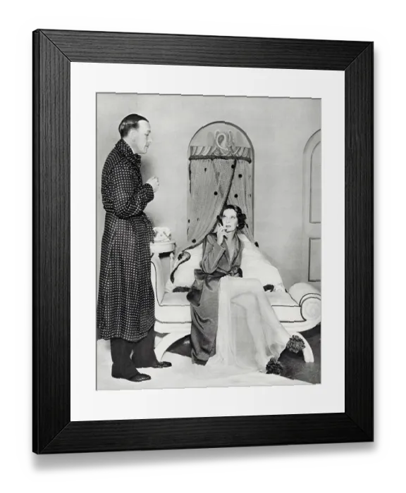 Framed Print : Photograph showing Noel Coward (1899-1973) and Gertrude Lawrence (1898-1952) starring in Coward's repertory Tonight at Seven Thirty, which included the piece Shadow Play, Manchester, 1935. Date: 1935 Framed Print : Photograph showing Noel Coward (1899-1973) and Gertrude Lawrence (1898-1952) starring in Coward's repertory Tonight at Seven Thirty, which included the piece Shadow Play, Manchester, 1935. Date: 1935