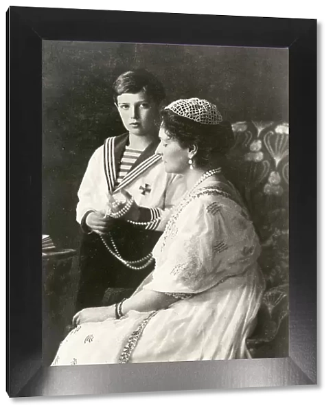 Tsaritsa Alexandra Feodorovna (1872-1918), Empress of Russia and wife of Tsar Nicholas II, together with her son the Tsesarevich Alexei (1905-1918). Date: 1913