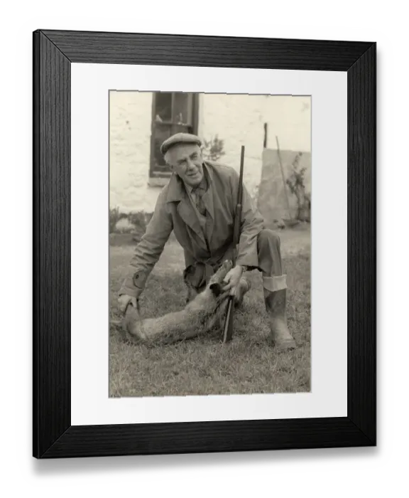 Framed Print : Farmer with fox Framed Print : Farmer with fox