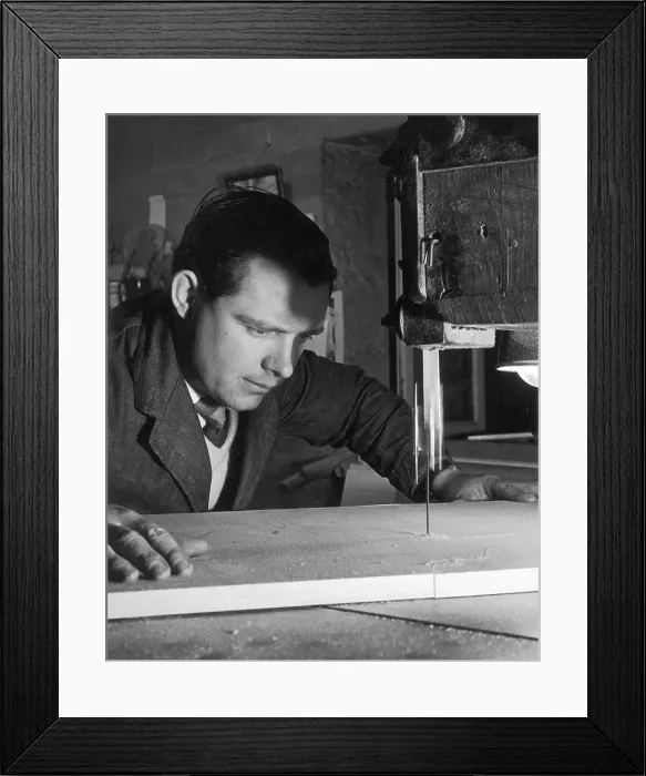 Framed Print : Jigsaw used to cut a piece of wood Framed Print : Jigsaw used to cut a piece of wood