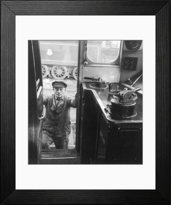 Framed Print : A Driver Climbing in to his Cab Framed Print : A Driver Climbing in to his Cab