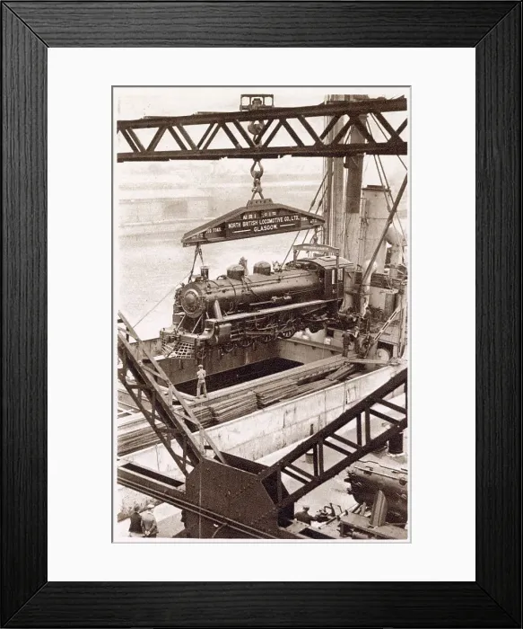 Framed Print : One of the eight engines built under contract by the North British Locomotive Company, Ltd, being shipped aboard the M. V Beldis. Date: 1933 Framed Print : One of the eight engines built under contract by the North British Locomotive Company, Ltd, being shipped aboard the M. V Beldis. Date: 1933