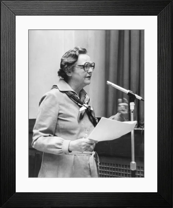 Framed Print : Jessica Mitford speaking at a microphone Framed Print : Jessica Mitford speaking at a microphone