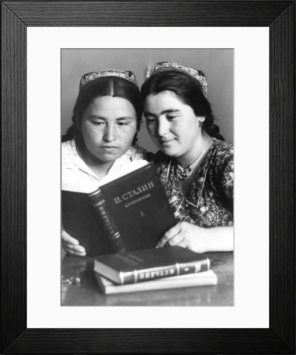 Framed Print : Young Uzbeks reading about Stalin
