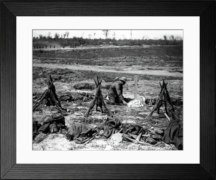 Framed Print : British soldier tidying grave of fallen colleague, WW1 Framed Print : British soldier tidying grave of fallen colleague, WW1