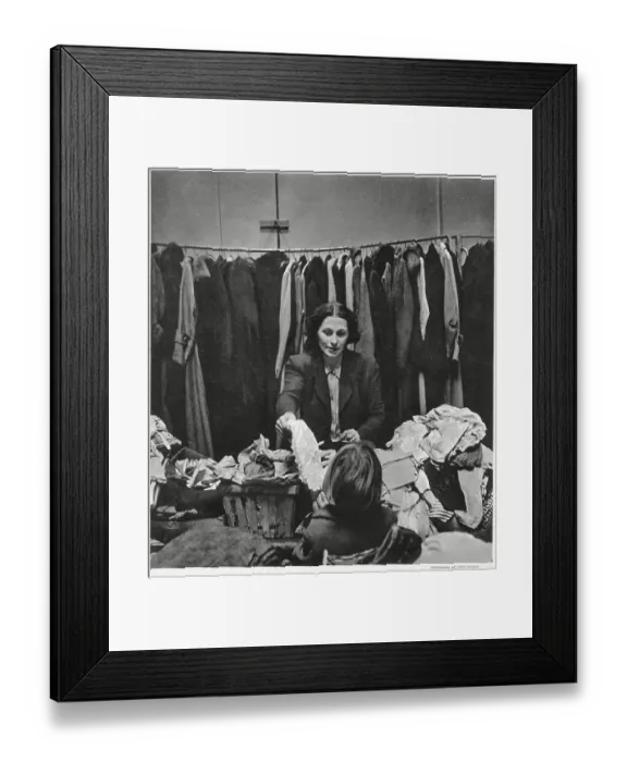 Framed Print : Mrs Robert Hudson wife of Minister of Agriculture and member of the Women's Voluntary Service, in East End, London. Giving out hundreds of articles of clothing and other comforts to homeless people who have lost their belongings Framed Print : Mrs Robert Hudson wife of Minister of Agriculture and member of the Women's Voluntary Service, in East End, London. Giving out hundreds of articles of clothing and other comforts to homeless people who have lost their belongings