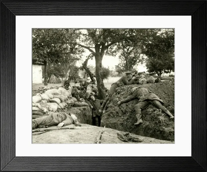 Framed Print : WW1 - British soldiers firing from a captured German trench Framed Print : WW1 - British soldiers firing from a captured German trench