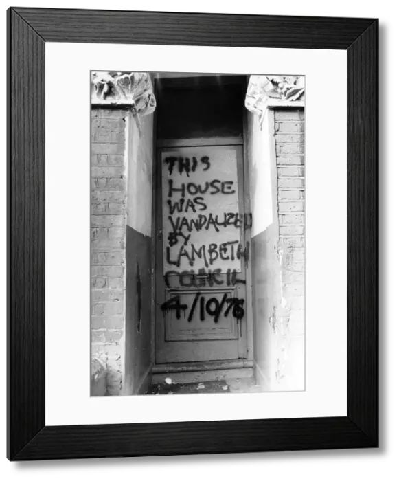 Framed Print : Graffitti on front door, Lambeth, South London Framed Print : Graffitti on front door, Lambeth, South London