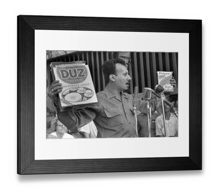 Framed Print : Major Faure Chomon with gift cartons, Cuba Framed Print : Major Faure Chomon with gift cartons, Cuba