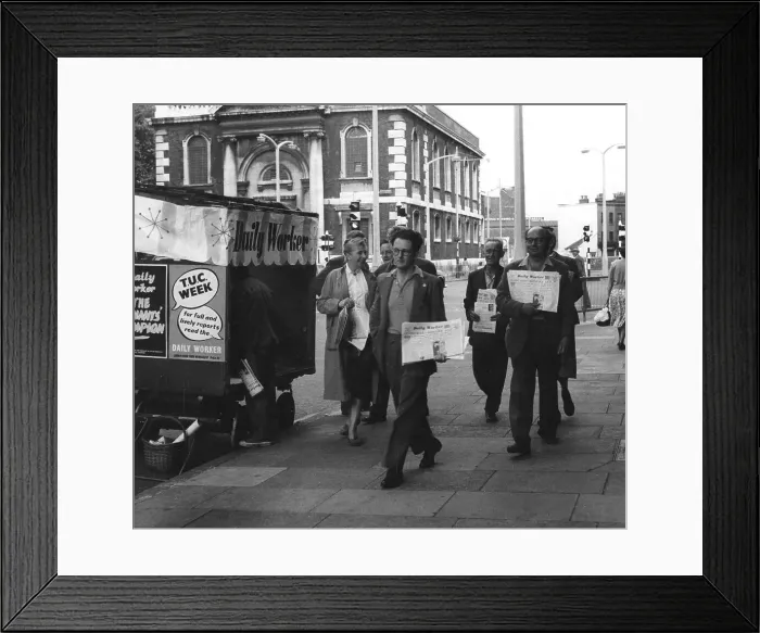 Framed Print : People on street with Daily Worker newspaper, London Framed Print : People on street with Daily Worker newspaper, London