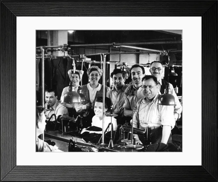 Framed Print : Men and women in a tailors workshop Framed Print : Men and women in a tailors workshop
