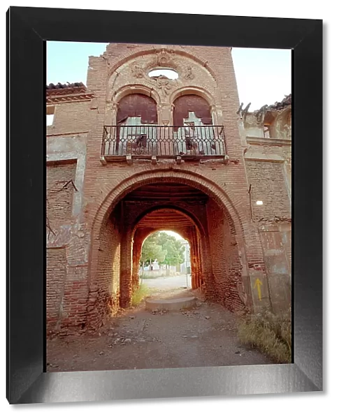 View looking out through gatehouse, Belchite, Spain